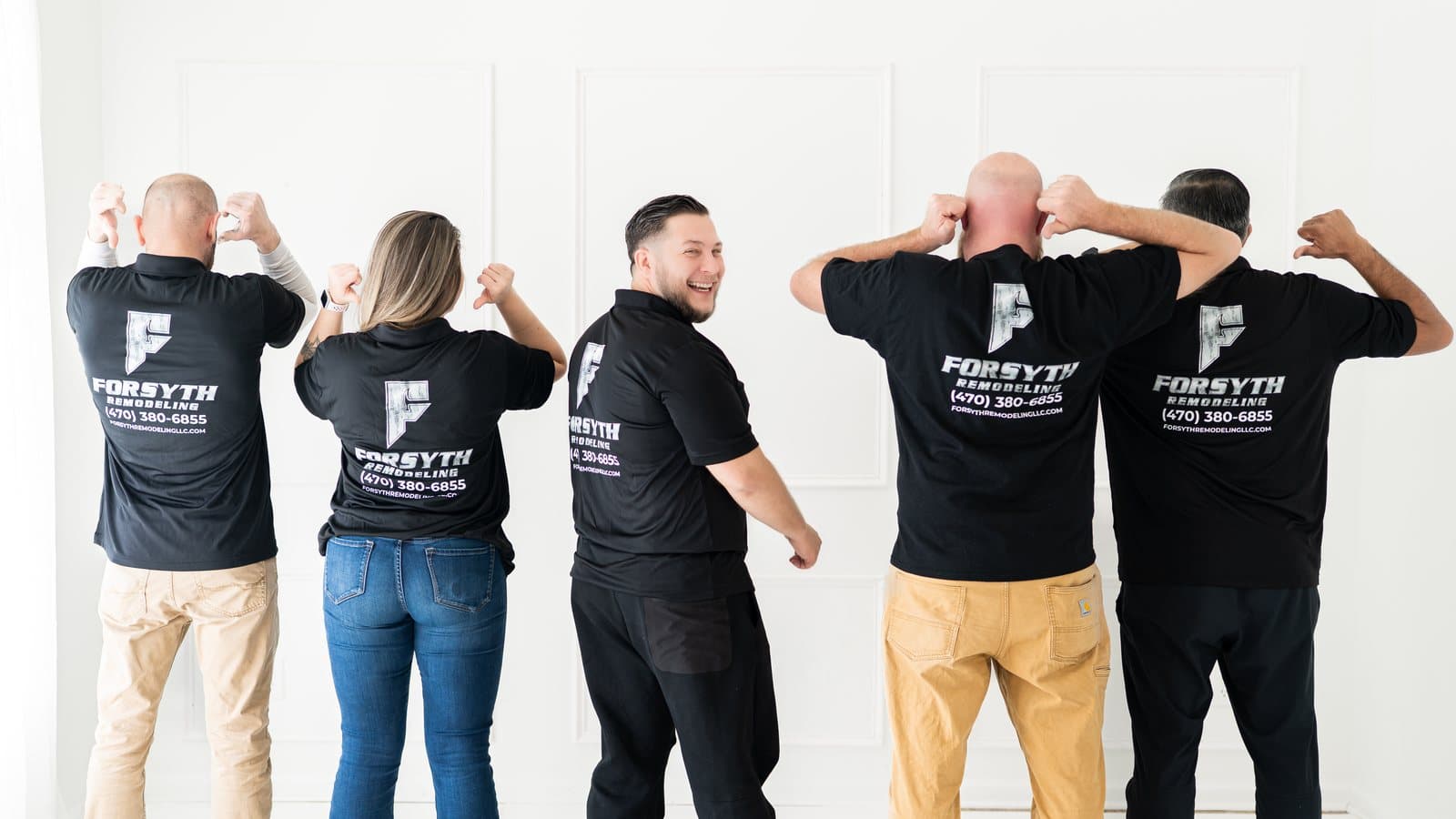 The Forsyth Remodeling crew in branded shirts